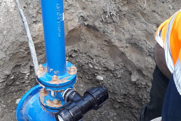 Workers laying water pipelines in Christchurch civil project