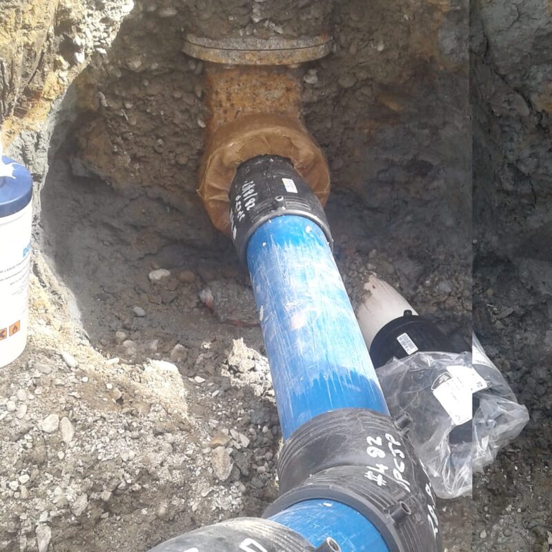 Water leak repair showing drainage pipes in Akaroa