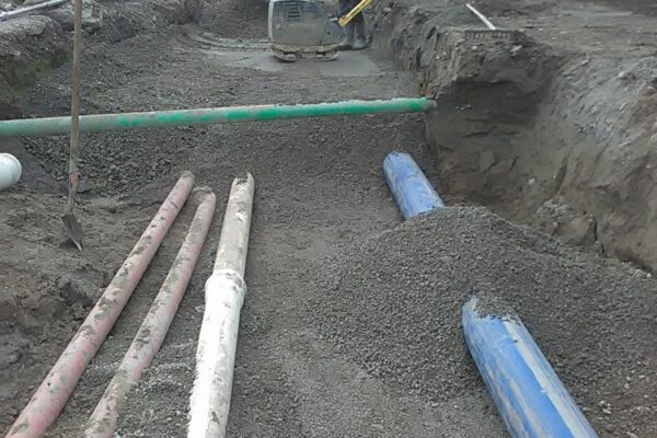 Workers laying water pipelines in Burnside civil project